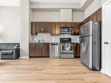 1 Den Loft-style unit available for immediate occupancy! - Photo 2