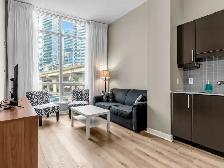 1 Den Loft-style unit available for immediate occupancy! - Photo 3