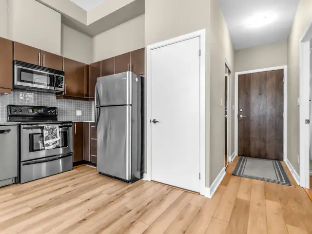 1 Den Loft-style unit available for immediate occupancy! - Photo 6