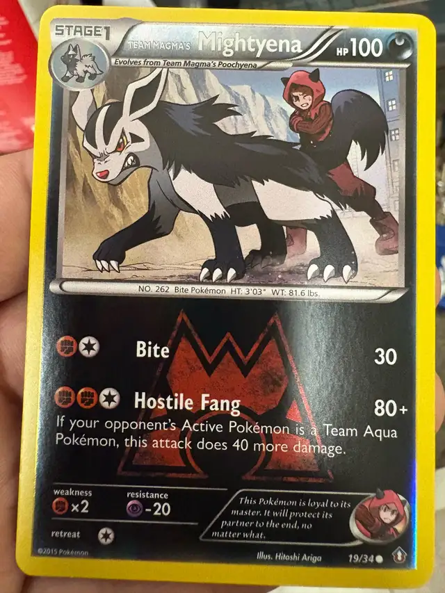 Team Magma’s Mightyena Pokemon Card