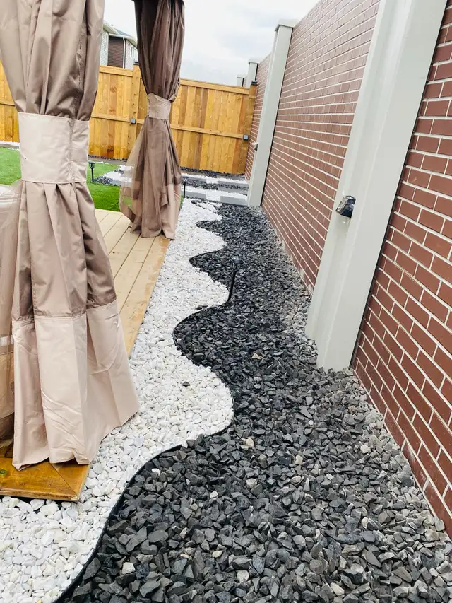 sod fence deck rocks junk removal landscaping - Photo 5