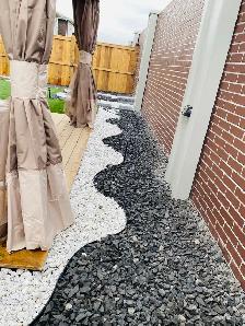 sod fence deck rocks junk removal landscaping - Photo 5