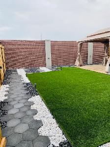 sod fence deck rocks junk removal landscaping - Photo 6