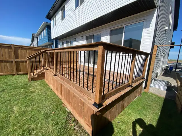 sod fence deck rocks junk removal landscaping - Photo 7