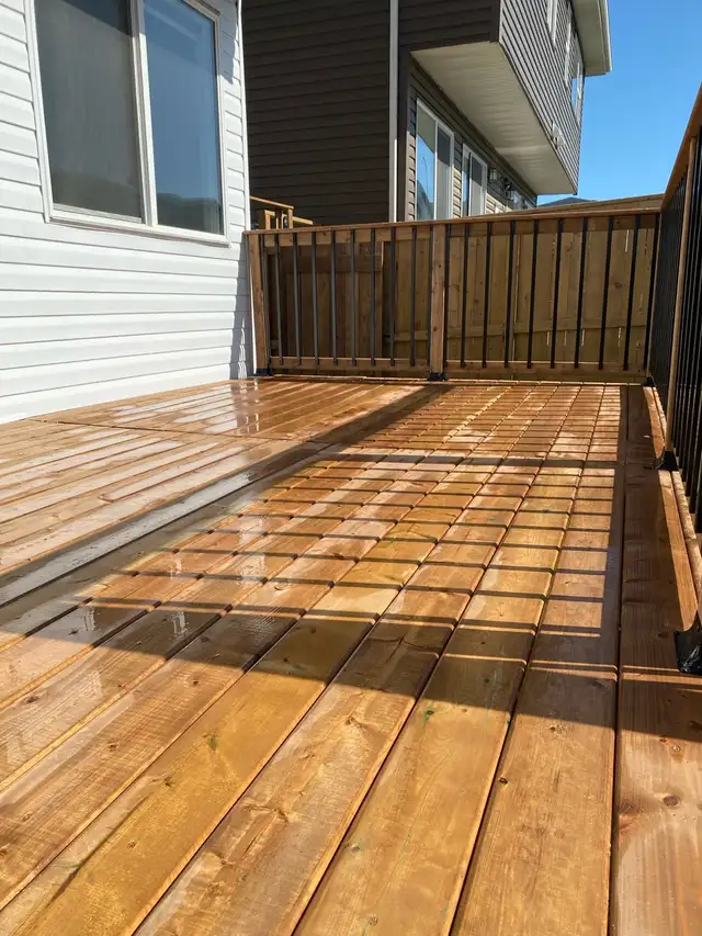 sod fence deck rocks junk removal landscaping - Photo 8