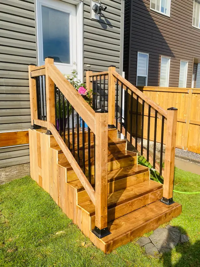 sod fence deck rocks junk removal landscaping - Photo 9