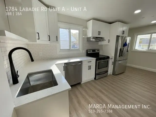 RENOVATED 3 BED/1 BATH MAIN FLOOR UNIT EAST WINDSOR   60% OF UTI - Photo 8