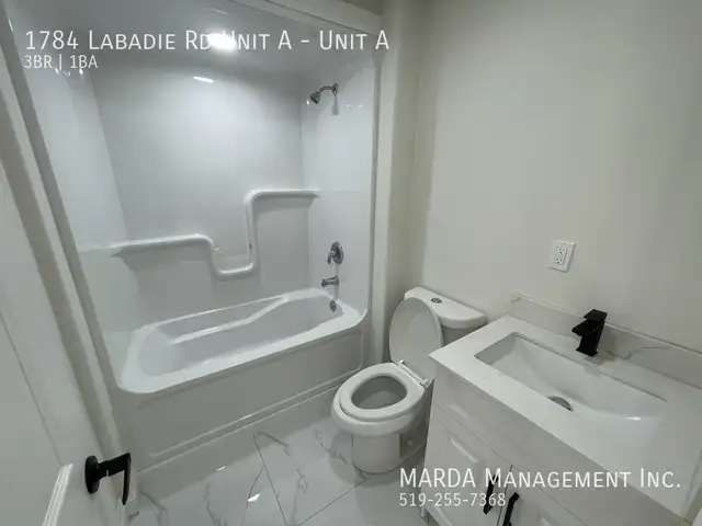 RENOVATED 3 BED/1 BATH MAIN FLOOR UNIT EAST WINDSOR   60% OF UTI - Photo 13