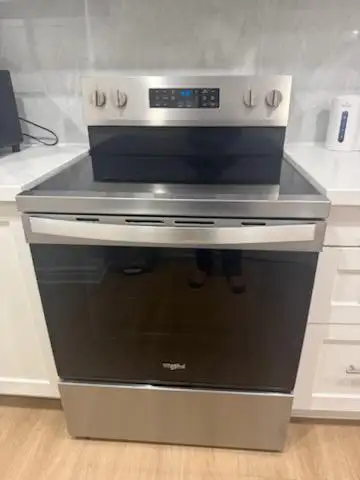 PREMIUM STAINLESS STEEL APPLIANCE PACKAGE – LIKE NEW! - Photo 6