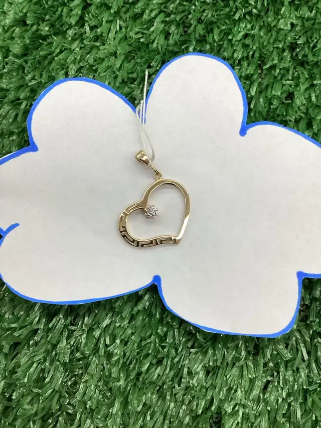 breloque cœur médusa en or