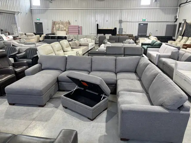 Grey fabric sectional with chaise and storage ottoman
