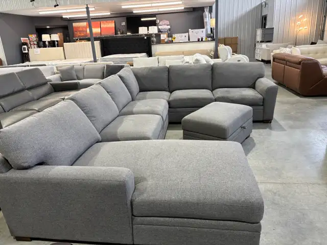 Grey fabric sectional with chaise and storage ottoman - Photo 2