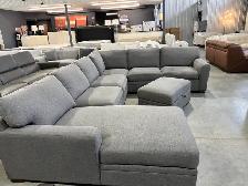 Grey fabric sectional with chaise and storage ottoman - Photo 2