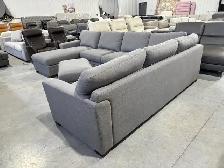 Grey fabric sectional with chaise and storage ottoman - Photo 4