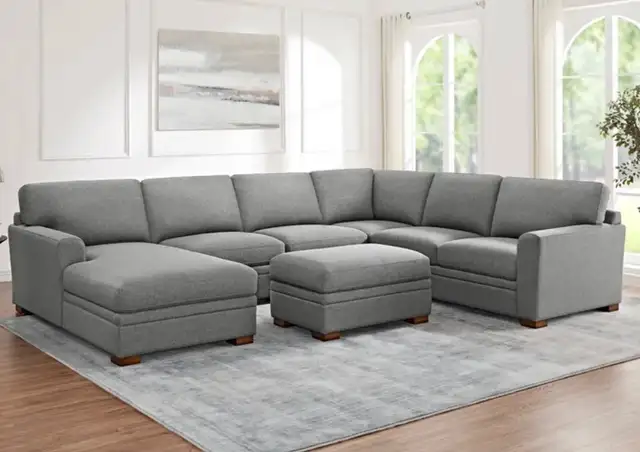 Grey fabric sectional with chaise and storage ottoman - Photo 5