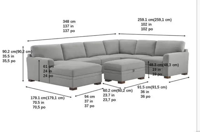 Grey fabric sectional with chaise and storage ottoman - Photo 6
