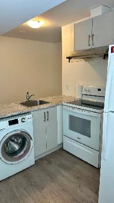 BEAUTIFUL BACHELOR GROUND FLOOR UNIT WITH WALKOUT YARD- WELLAND