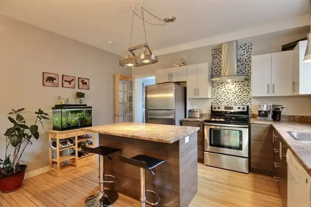 Superbe grand 3 1/2, style condo, CLÉ EN MAIN Juillet - Photo 2