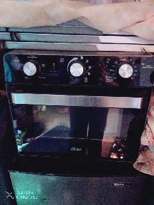 Oster all in 1  toaster oven - Photo 2