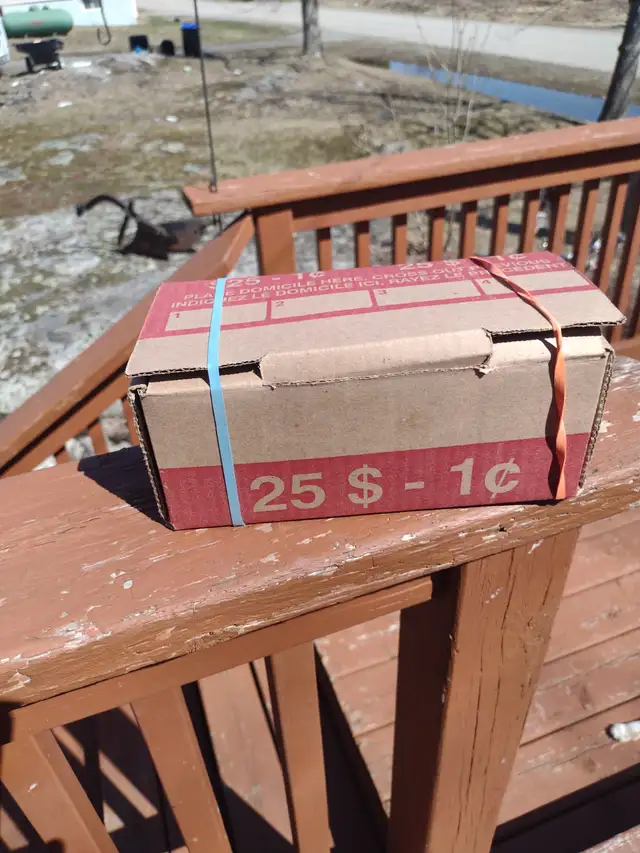 Unsearched box of Canadian and American pennies 2,500 pennies