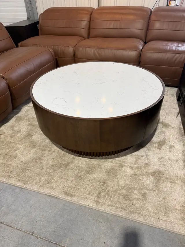 Round stone top coffee table