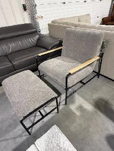 Grey fabric sling chair with ottoman