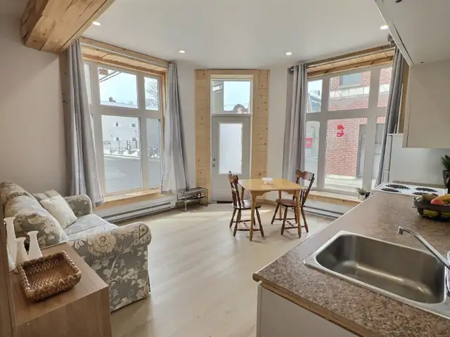 APPARTEMENT MEUBLÉ-TOUT INCLUS 2 CHAMBRES 4 1/2 CENTRE VILLE - Photo 4