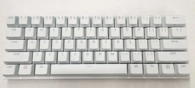 Razer Huntsman Mini gaming keyboard with box and wire