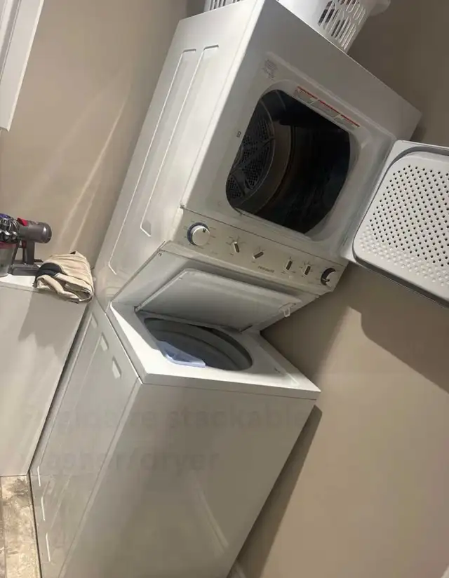 Stackable washer and dryer delivered and installed - Photo 2