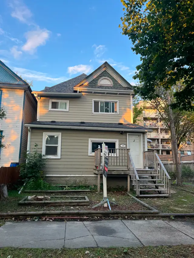 Solid 4-Plex w/ plenty of upgrades! Walking distance to U of W! - Photo 2