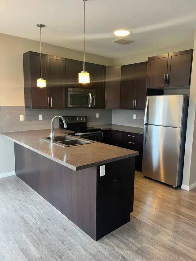 3 bed/2 bath end unit townhouse for rent in Penhold!