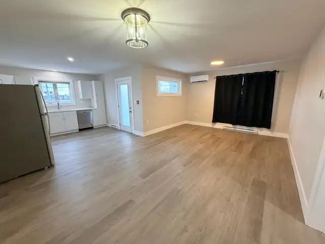 Brand new ground floor 1-bedroom apartment with walk-out balcony