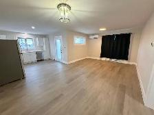 Brand new ground floor 1-bedroom apartment with walk-out balcony