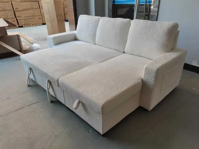 Coudroy sofa bed with storage, reversible chaise, bookshelf and