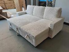 Coudroy sofa bed with storage, reversible chaise, bookshelf and