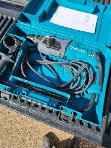 Makita hammer drill, like new, $ 200