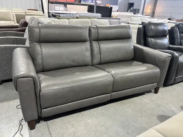 Grey leather power reclining sofa