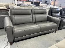 Grey leather power reclining sofa