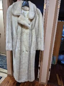 Fur coat, size 10-12, lined. $ 100