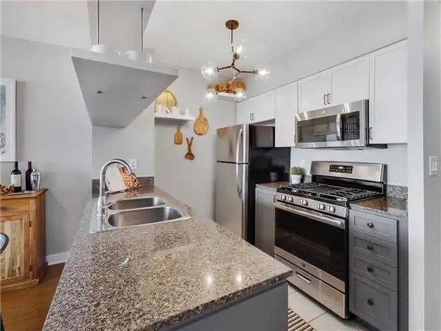 Lakeshore View 1  1 Den, Utilities, Parking & Locker INCLUDED! - Photo 3