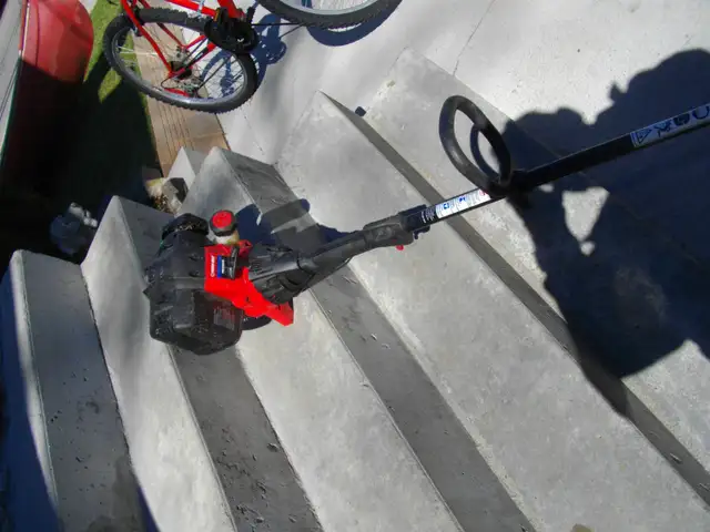 GAS POWERED WEED WACKER FOUND IN STORAGE SHED - Photo 2