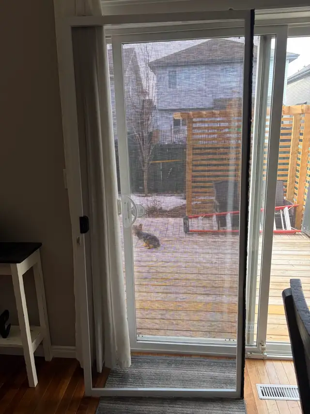 Patio screen door - brand new- paid $350