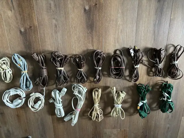 LOTS OF INDDOR AND OUTDOOR EXTENSION CORDS......