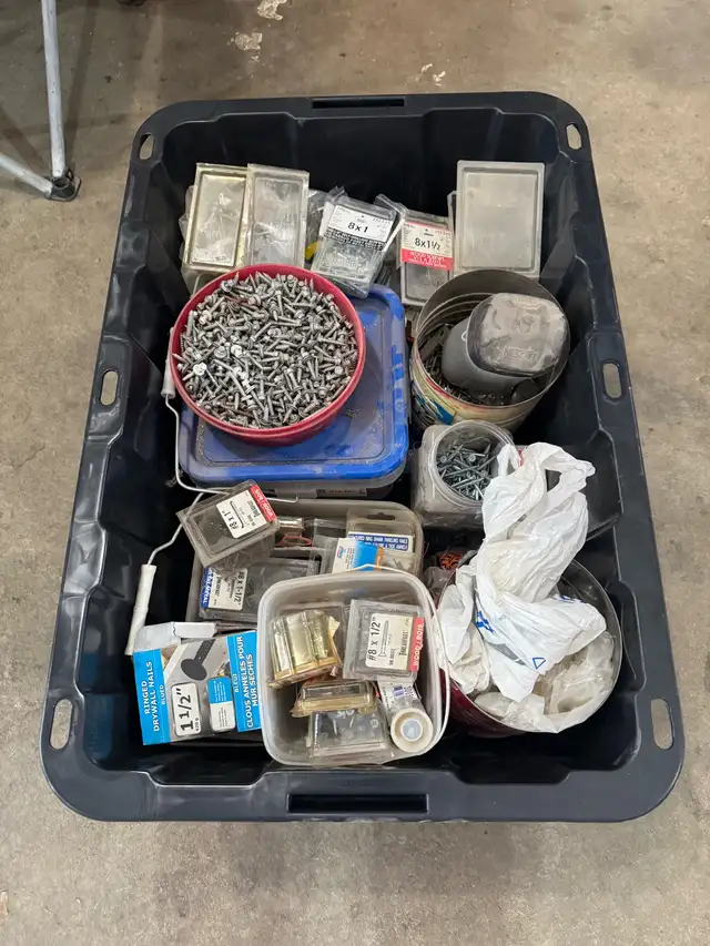 102 liter tote full of screws and nails