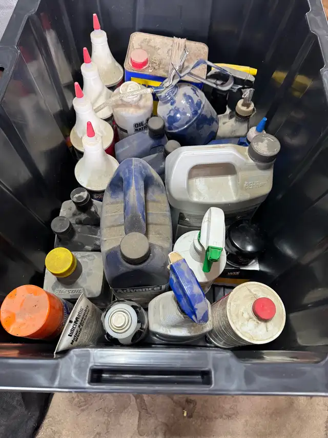 tote of engine/auto oils and cleaners
