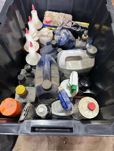tote of engine/auto oils and cleaners