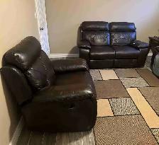 Dark brown leather recliner love seat & chair seat. Used In