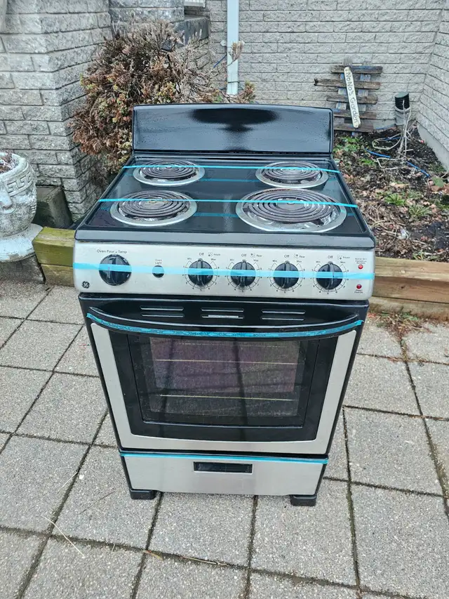 Like NEW GE 24' Stainless Steel Slide-in Electric Coil Top Stove
