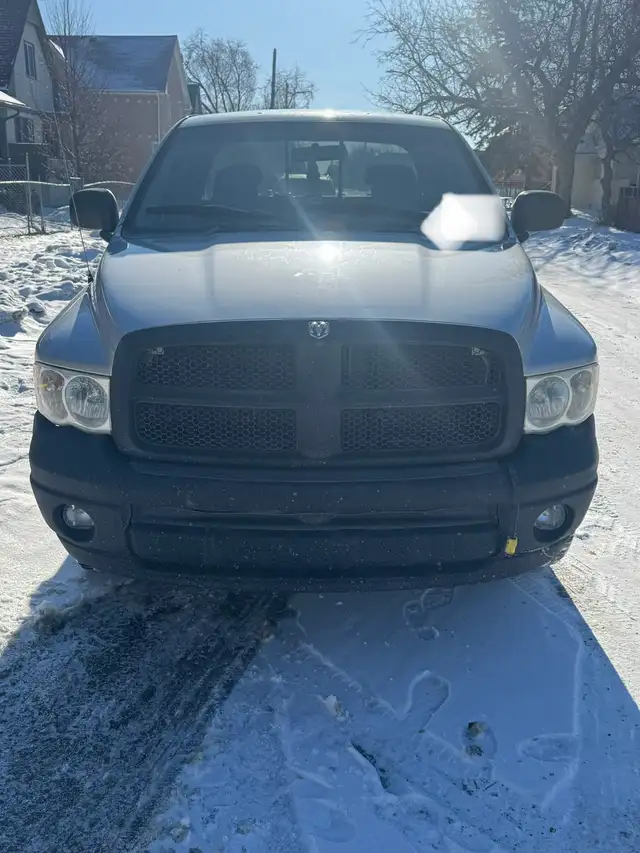 2004 Dodge Ram 1500 SLT QuadCab 4x4.