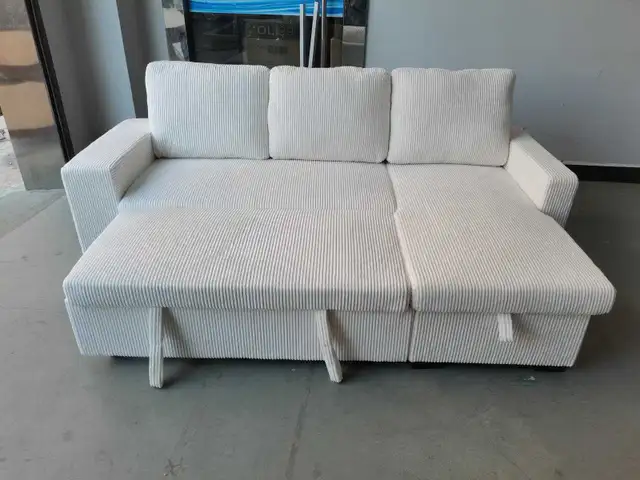 Coudroy sofa bed with storage, reversible chaise, bookshelf and